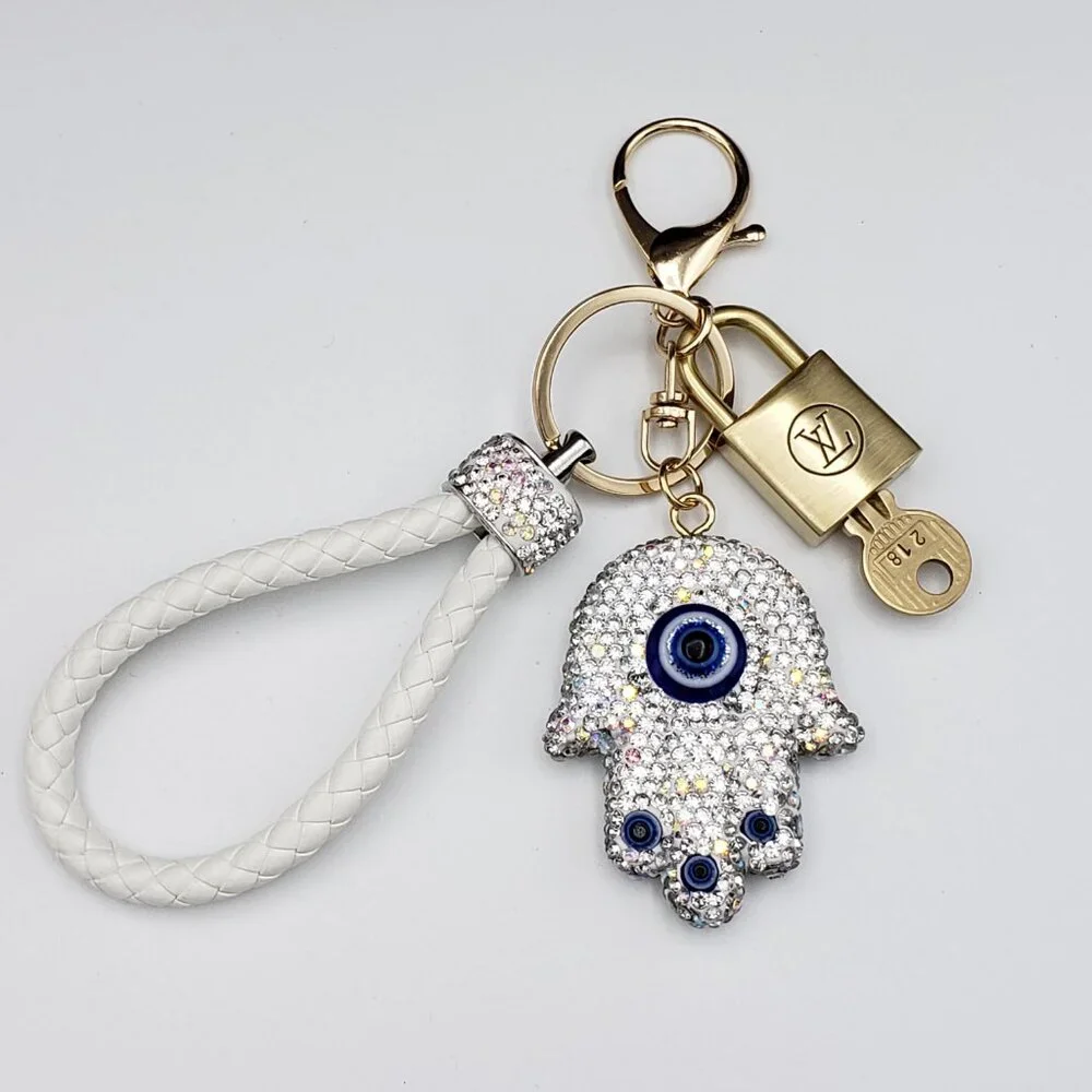 Louis Vuitton Gold Lock 🔒 Authentic LV Key + Unbranded Evil Eye Bag Charm - Picture 2 of 9